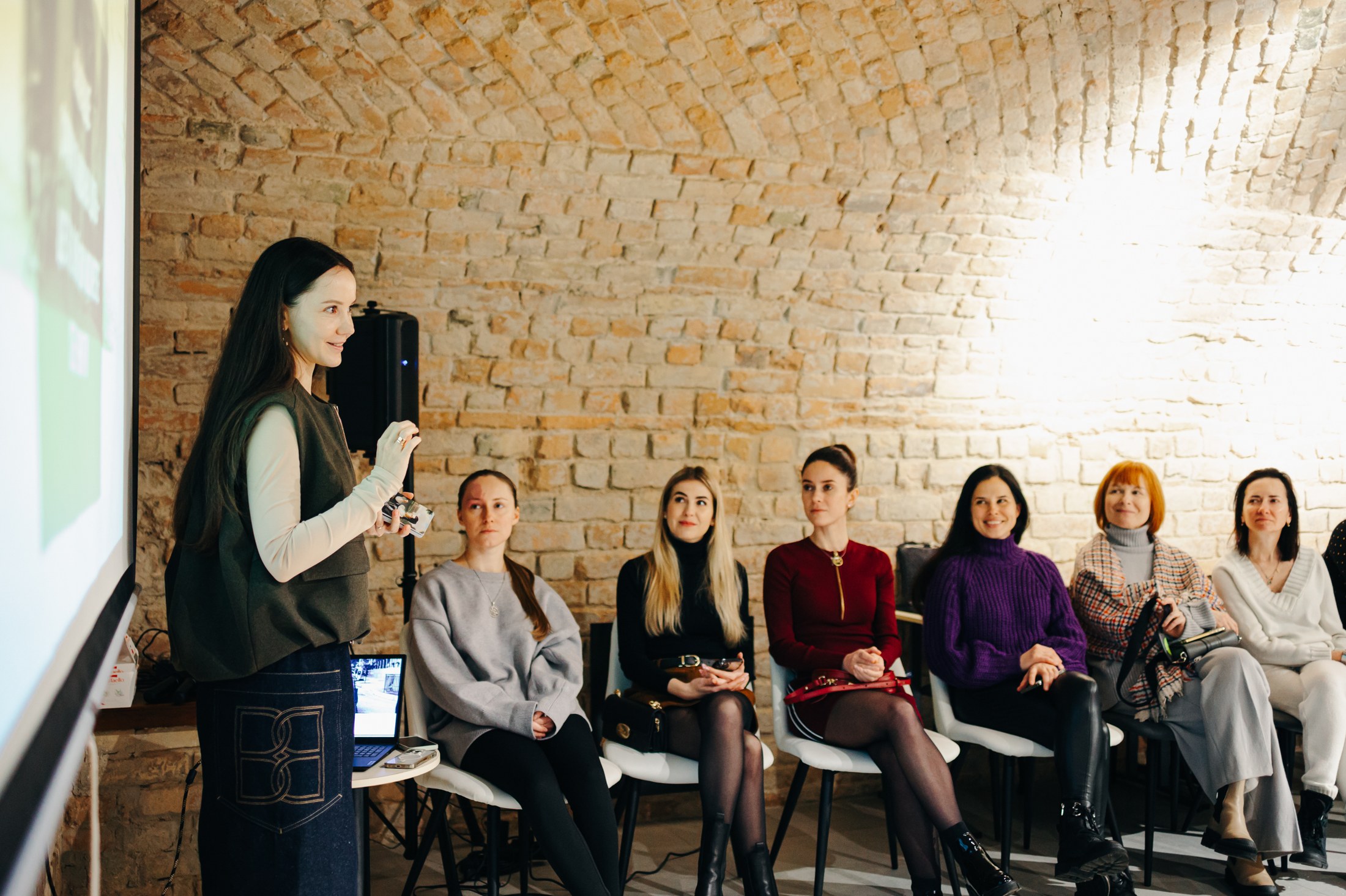 A presentation at a Pro Women UA community meeting