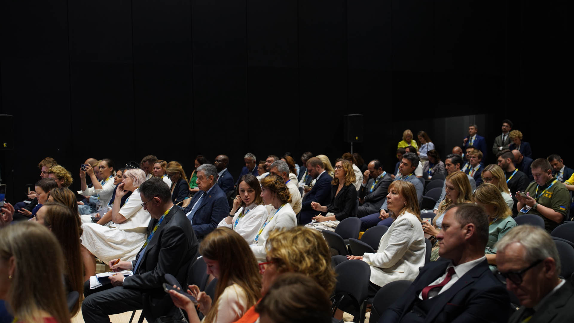 Ukraine Recovery Conference participants seated during a panel discussion